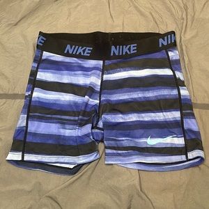 blue and black child large nike pros!